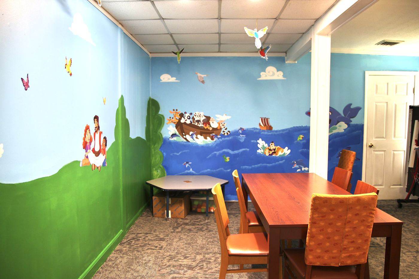 The children's room with a hand-painted Noah's Ark mural